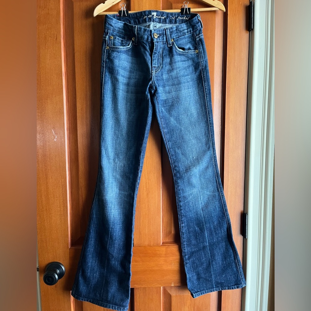 7 For All Man Kind denim low rise bootcut Jean. Woman’s Size 24